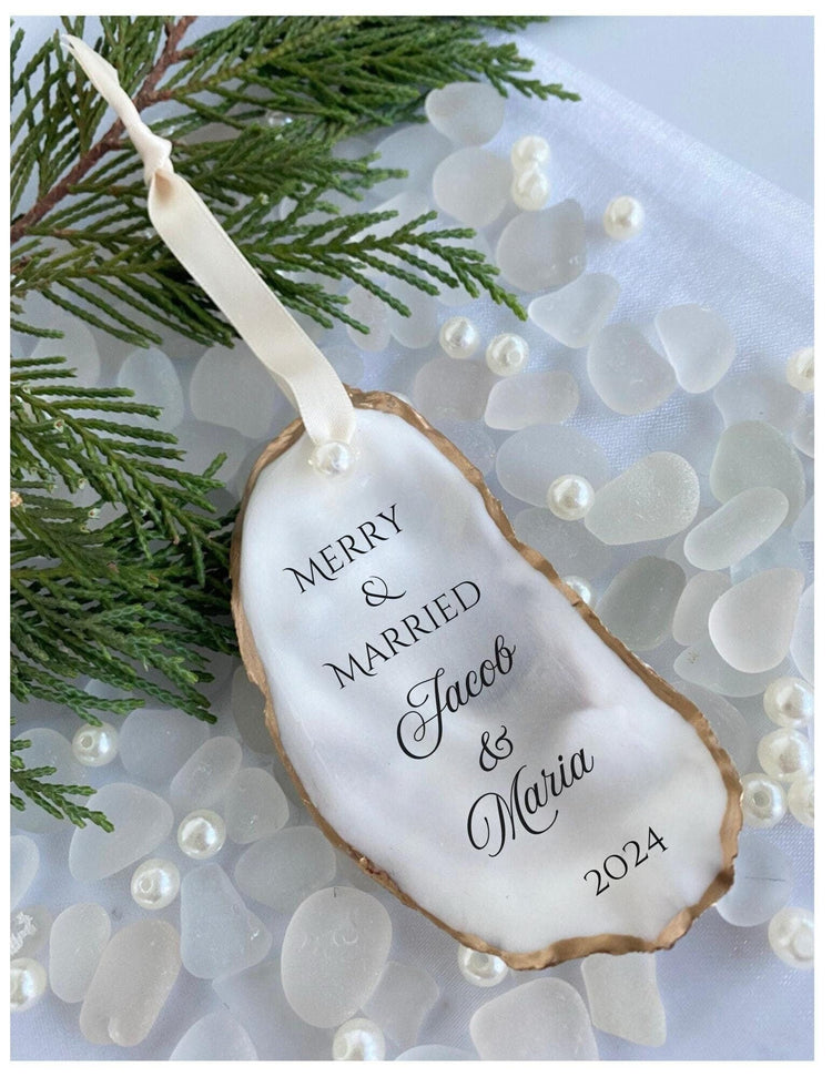 All natural handmade personalized oyster shell ornament with pearl paint and gold gild paint on edges adorned with ivory or rose gold satin ribbon and a cultured pearl for Married Couple