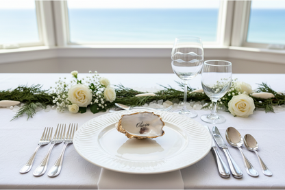 Luxury oyster place card on a beautiful modern coastal wedding place setting. 