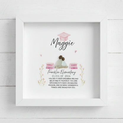 Framed sea glass and pebble art graduation gift framed with text and illustrations on a white background
