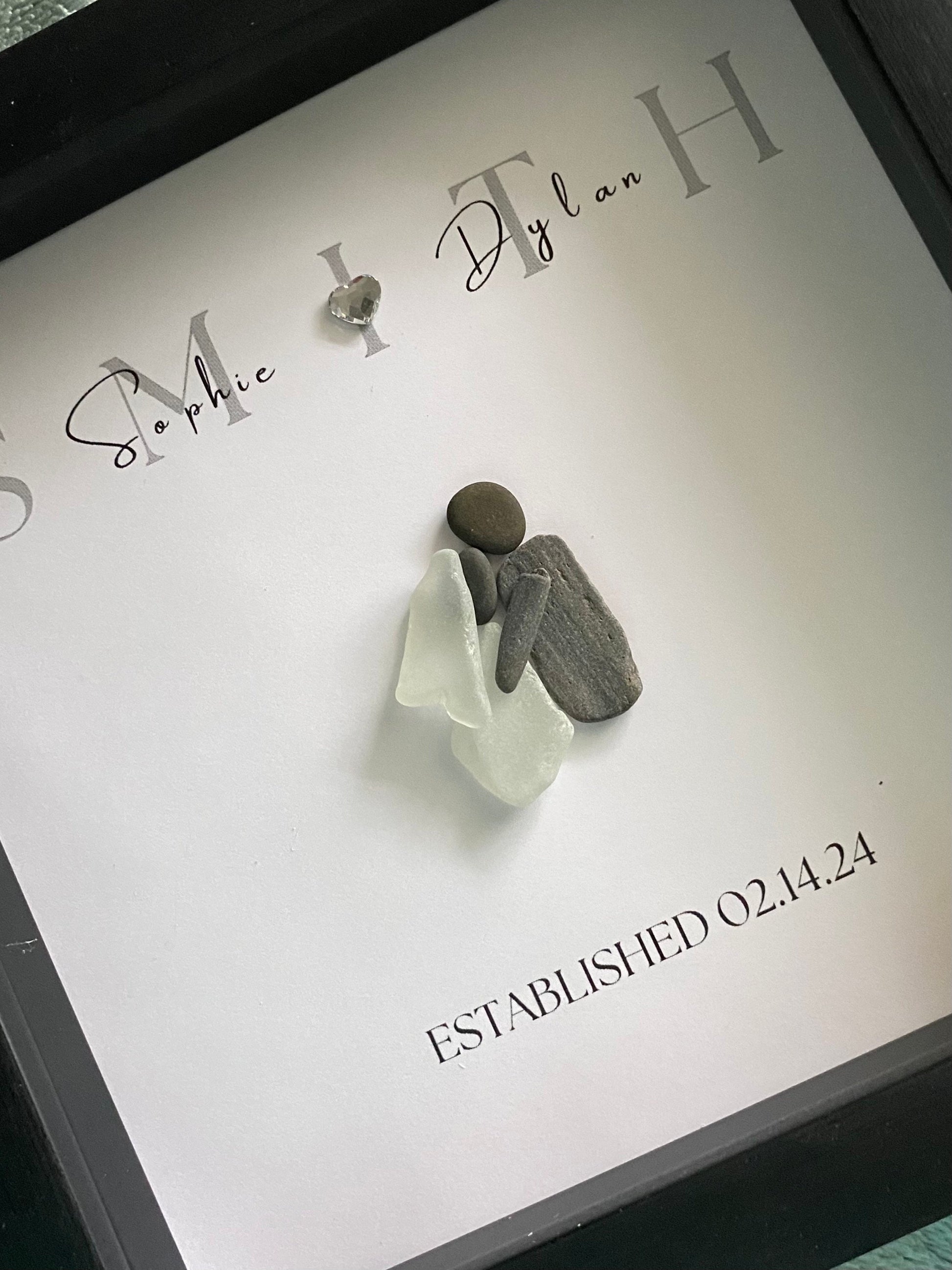 Personalized framed sea glass art for couples featuring bride and groom with names and wedding date in a 9x9 shadow box.