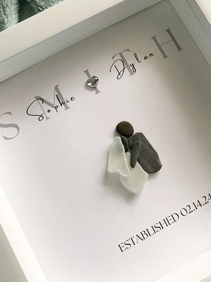 Personalized framed sea glass art for couples featuring bride and groom with names and wedding date in a 9x9 shadow box.