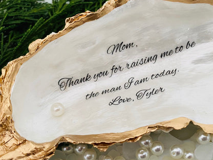 Oyster shell with text Mom, Thank you for raising me to be the man I am today. Love, Tyler