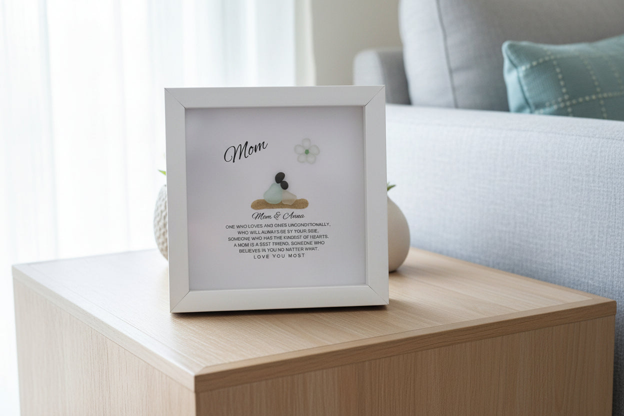Framed picture of a poem for 'Mom' on a wooden surface with a blurred background