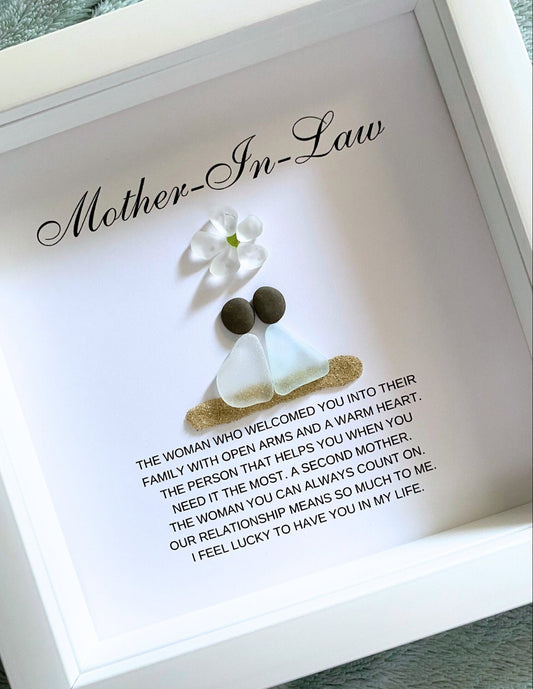 Personalized framed sea glass art for mother-in-law featuring two figures, a small glass flower, names, and custom message in a 9x9 shadow box.