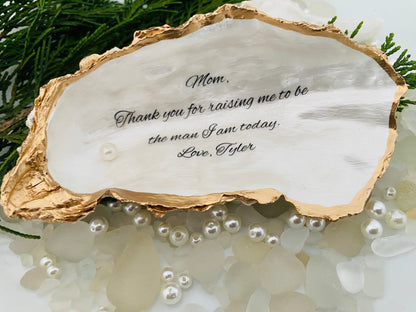 Oyster shell with text Mom, Thank you for raising me to be the man I am today. Love, Tyler